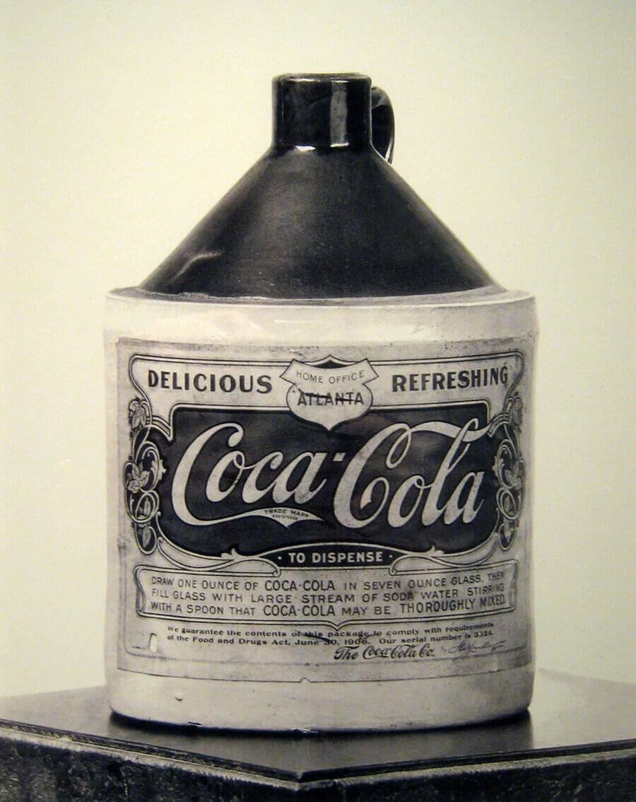 Coka-Cola bottle of syrup to be mixed with carbonated water via a soda fountain